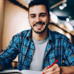 Male college student studying