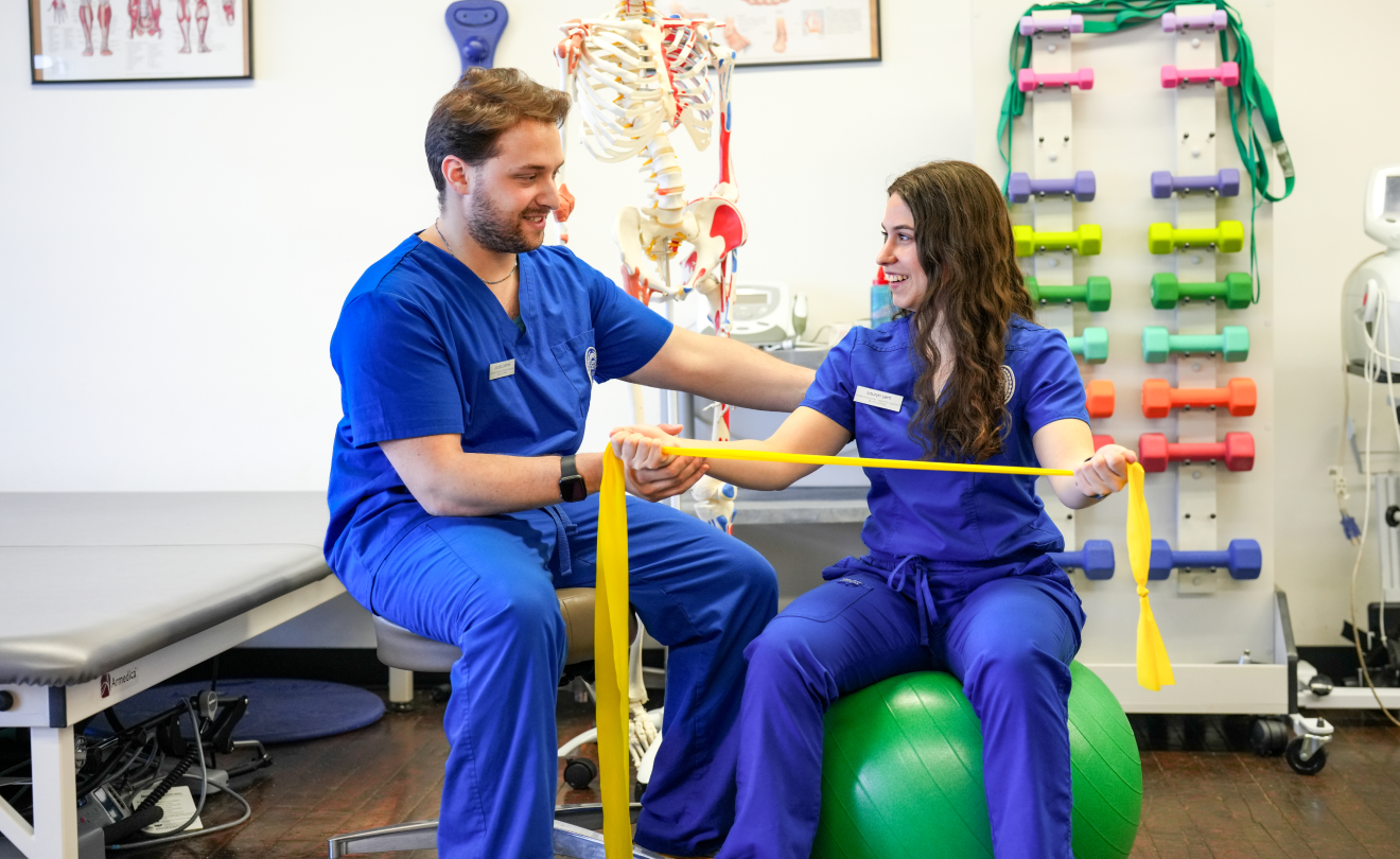 male and female PTA students in lab